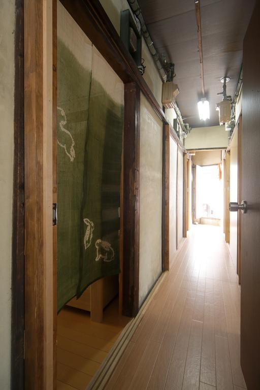 Guesthouse Oasis Osaka Bagian luar foto