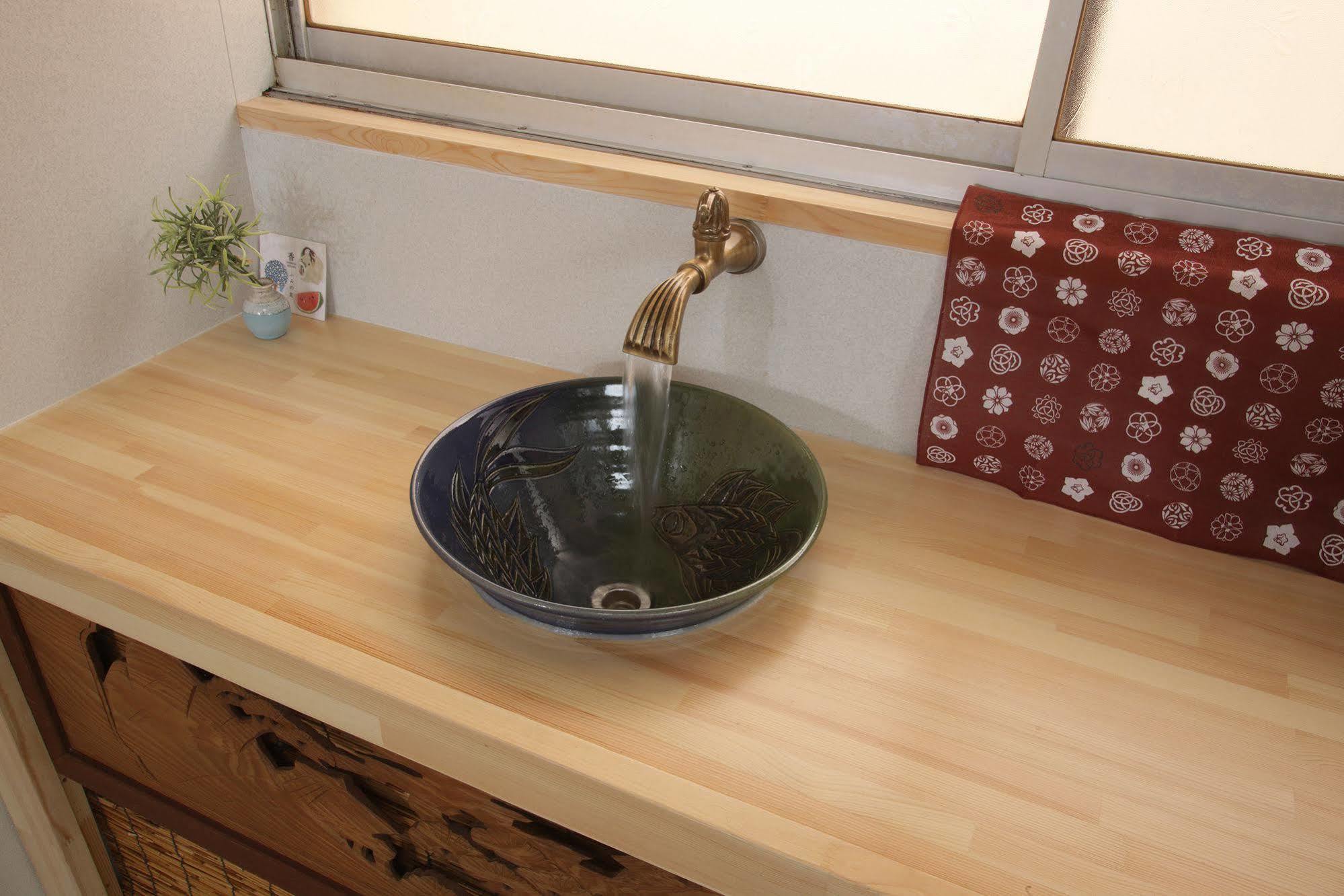 Guesthouse Oasis Osaka Bagian luar foto