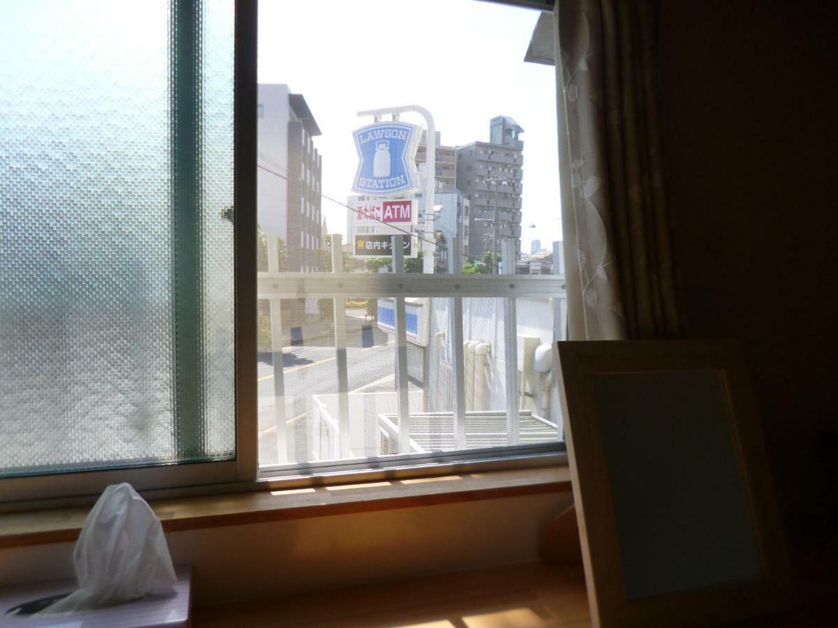 Guesthouse Oasis Osaka Bagian luar foto